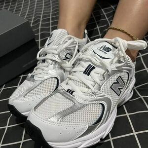 New Balance women's White and Gray Sneakers